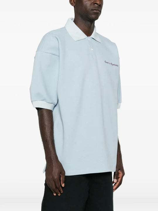 Blue top worn by a person, showing the top fit