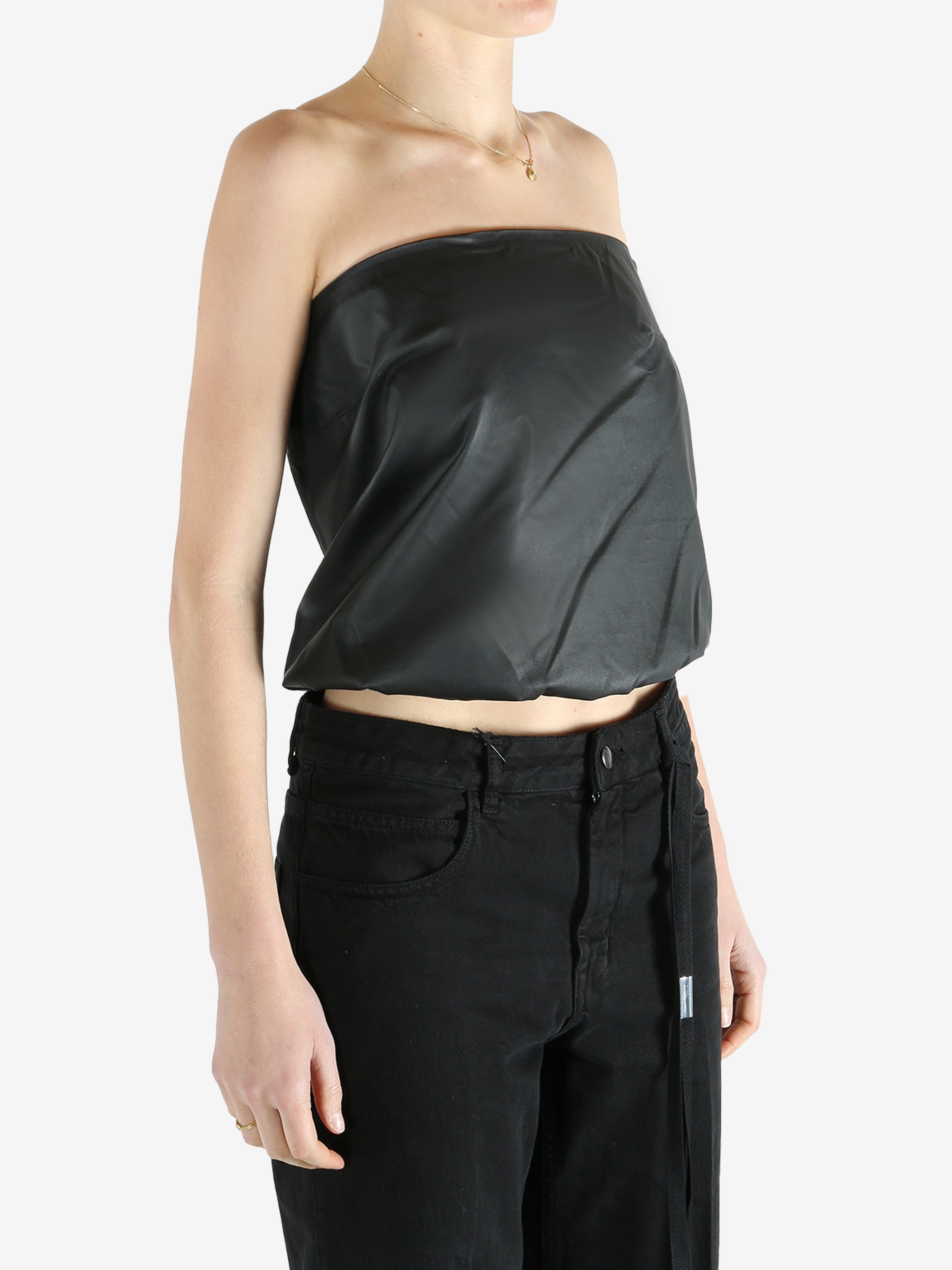 black top worn by a person, showing the top fit