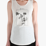 White top worn by a person, showing the top's fit