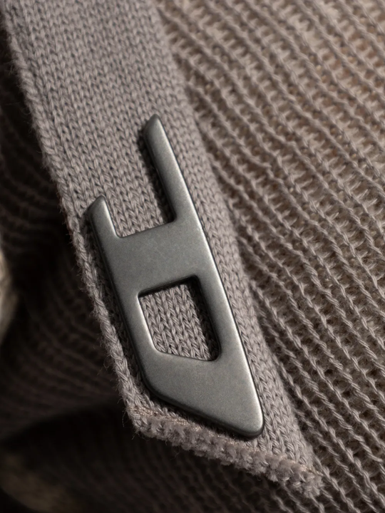 Close up of grey top, showing texture of the cotton fabric