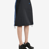 Black skirt worn by a person, showing the skirt 's fit