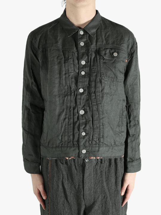 Black jacket worn by a person, showing the jacket's fit