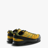 Yellow and black athletic shoe,back view
