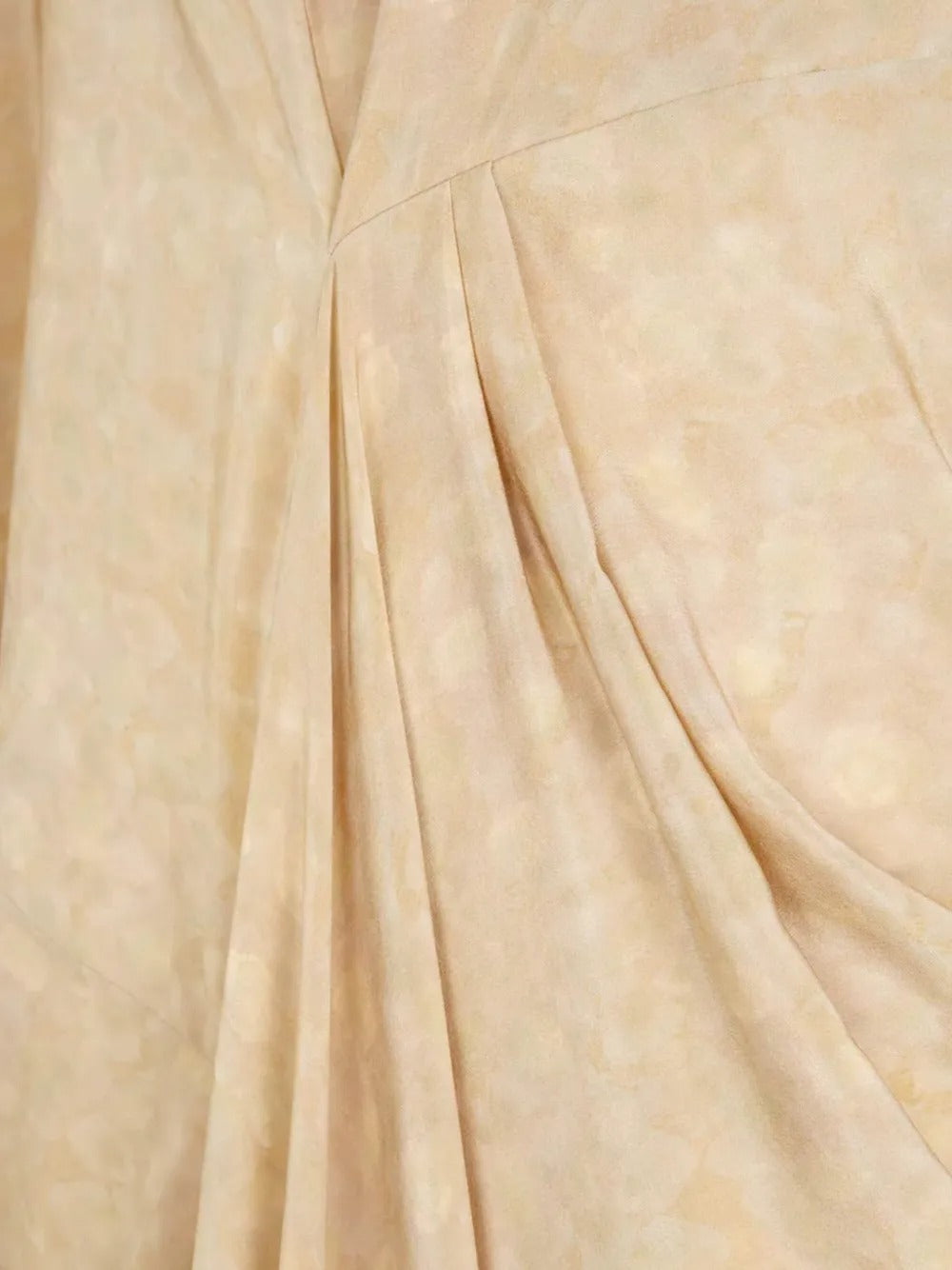 Close up of yellow dresses , showing texture of the silk fabric