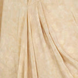 Close up of yellow dresses , showing texture of the silk fabric