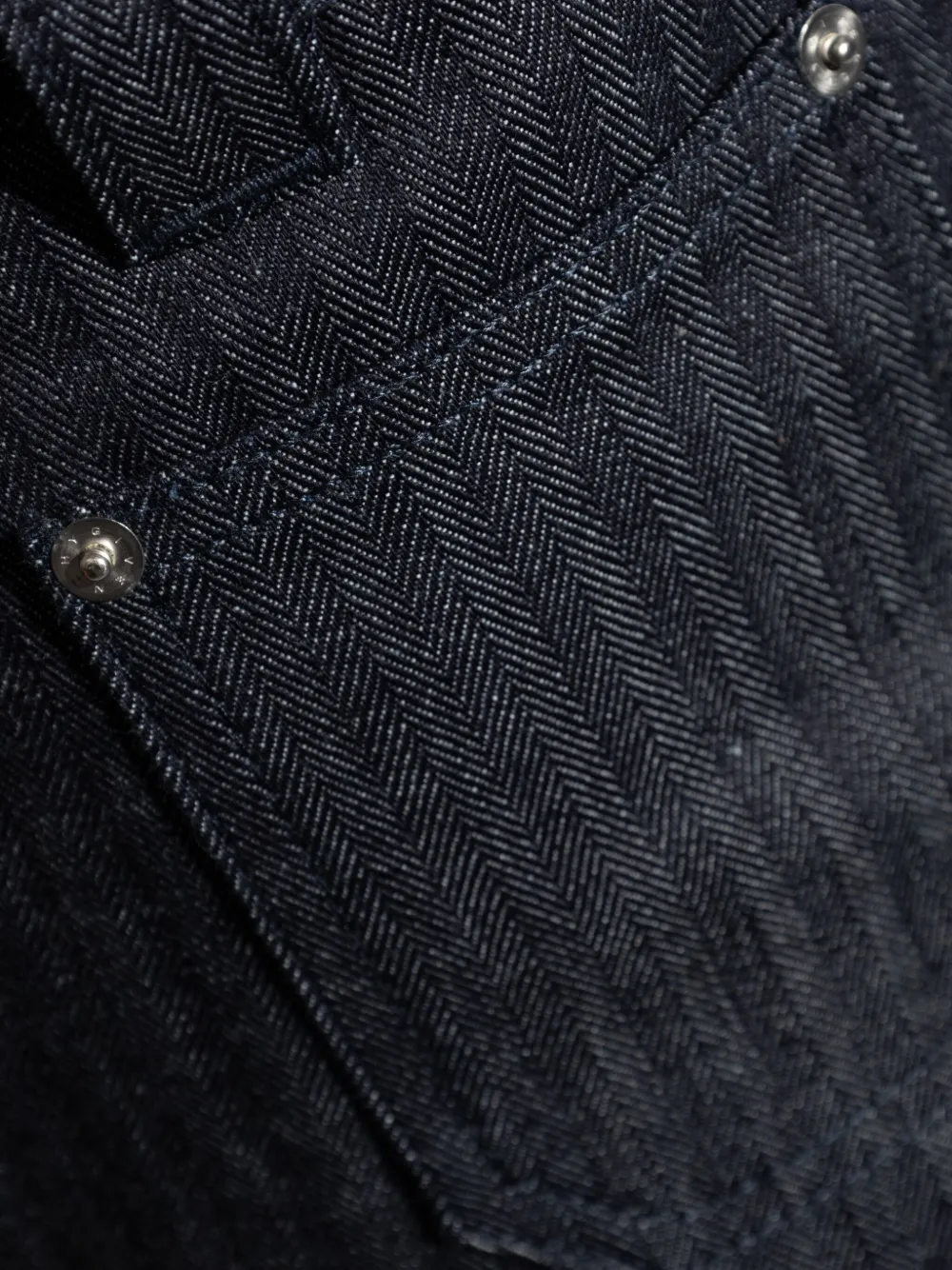 Close up of the blue pants, showing texture of the cotton fabric