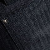 Close up of the blue pants, showing texture of the cotton fabric