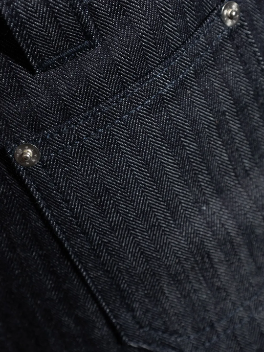 Close up of the blue pants, showing texture of the cotton fabric