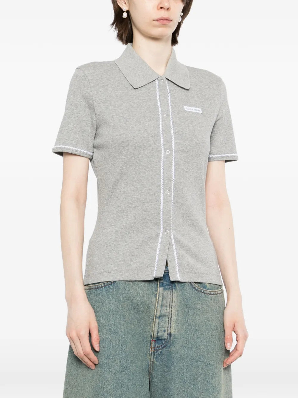 Grey t-shirt worn by a person, showing the t-shirt fit