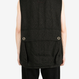 Black jacket worn by a person, showing the jacket fit