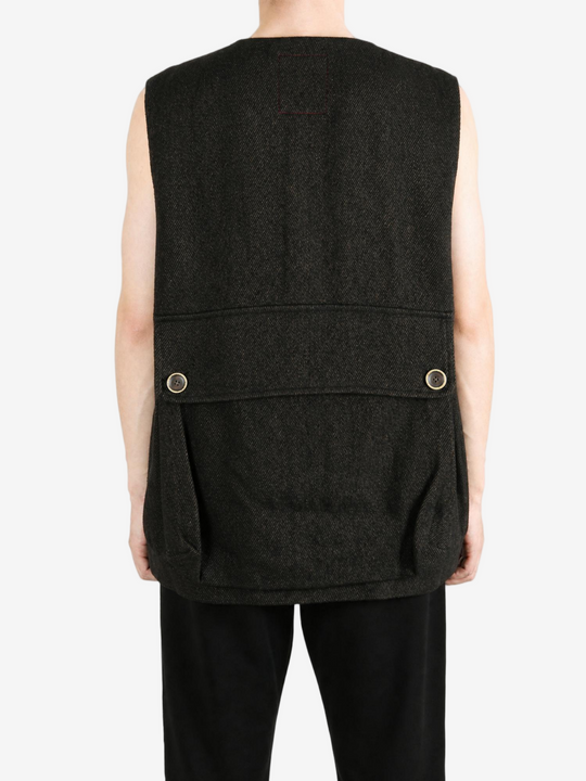 Black jacket worn by a person, showing the jacket fit