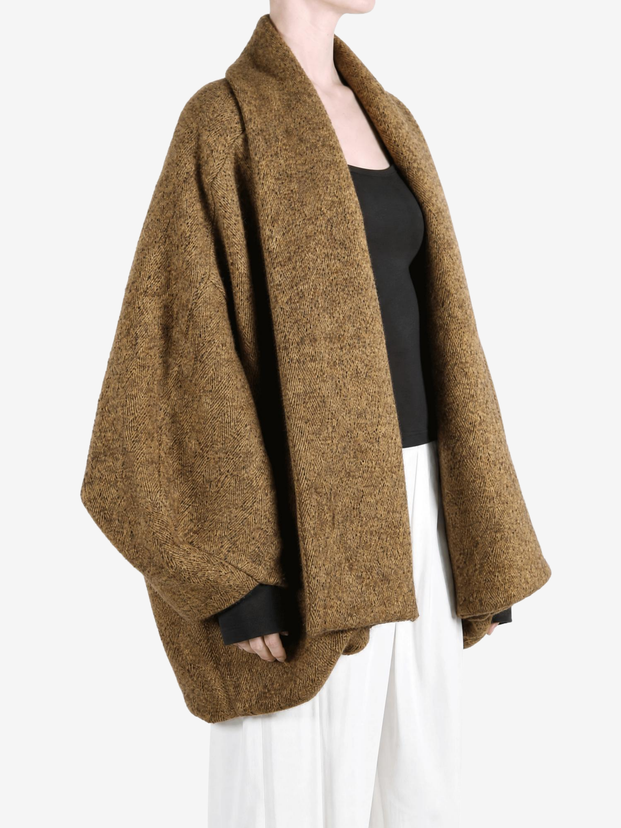 Brown jacket worn by a person, showing the jacket fit