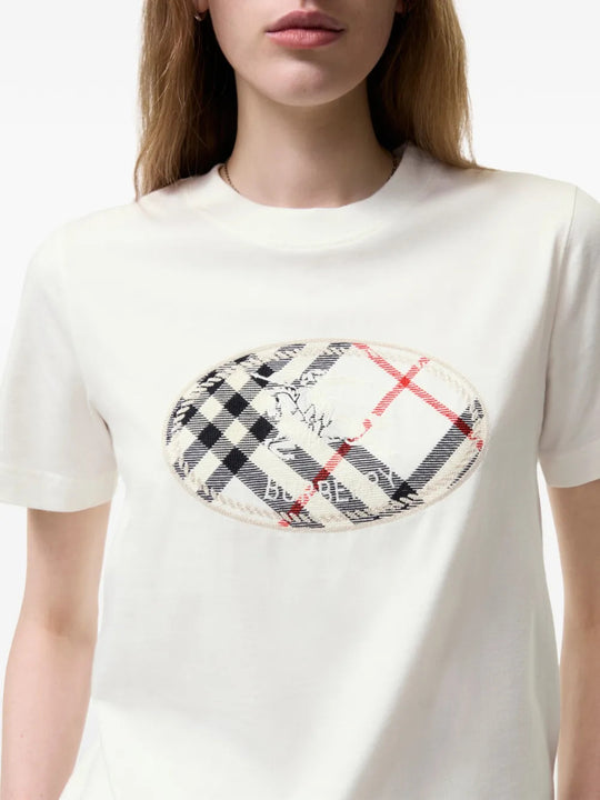 Tan t-shirt worn by a person, showing the t-shirt fit