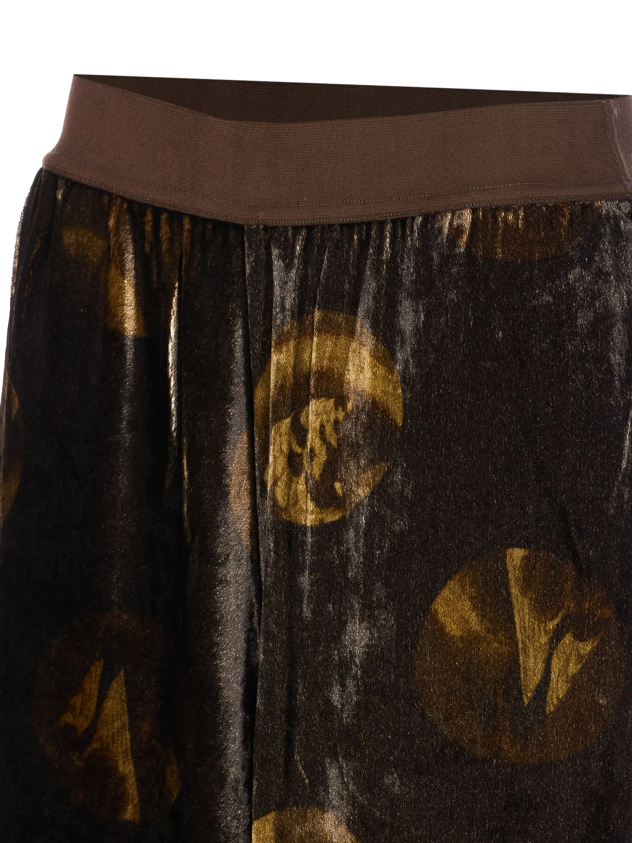 Close up of brown pants, showing texture of the viscose fabric