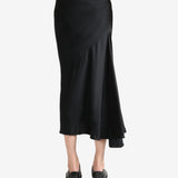 Black skirt worn by a person, showing the skirt's fit