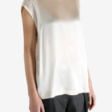 Grey t-shirts worn by a person, showing the t-shirts fit