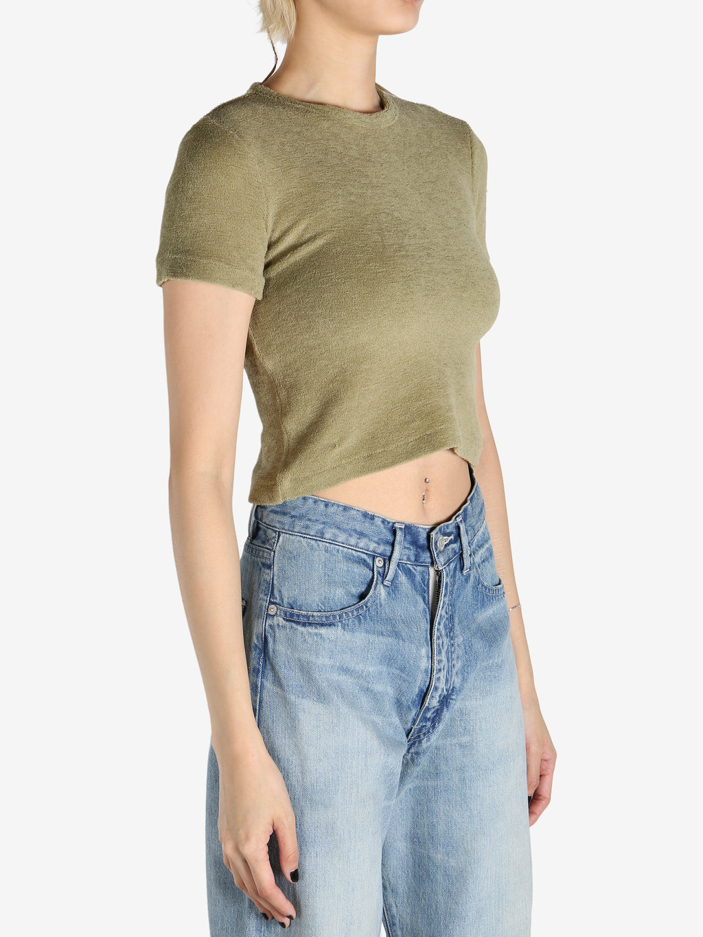 Green T-shirt worn by a person, showing the shirt's fit