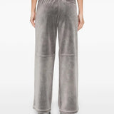 Grey pants worn by a person, showing the pants' fit