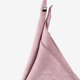 Close up of pink scraf, showing texture of the cotton fabric