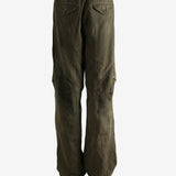 Green pants worn by a person, showing the pants fit