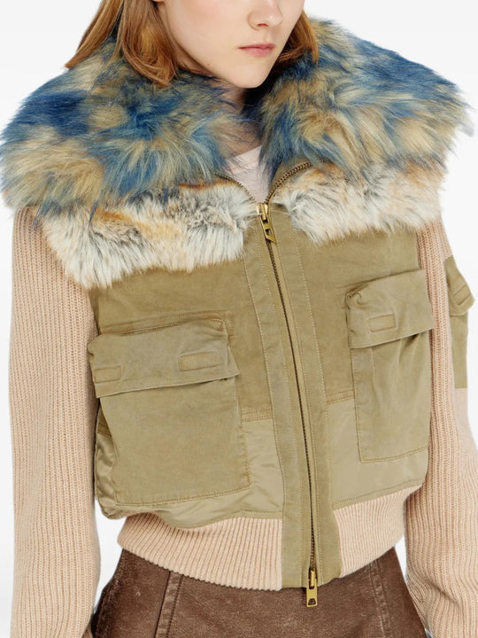 Tan jacket worn by a person, showing the jacket fit