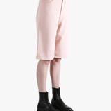 Pink shorts worn by a person, showing the shorts's fit