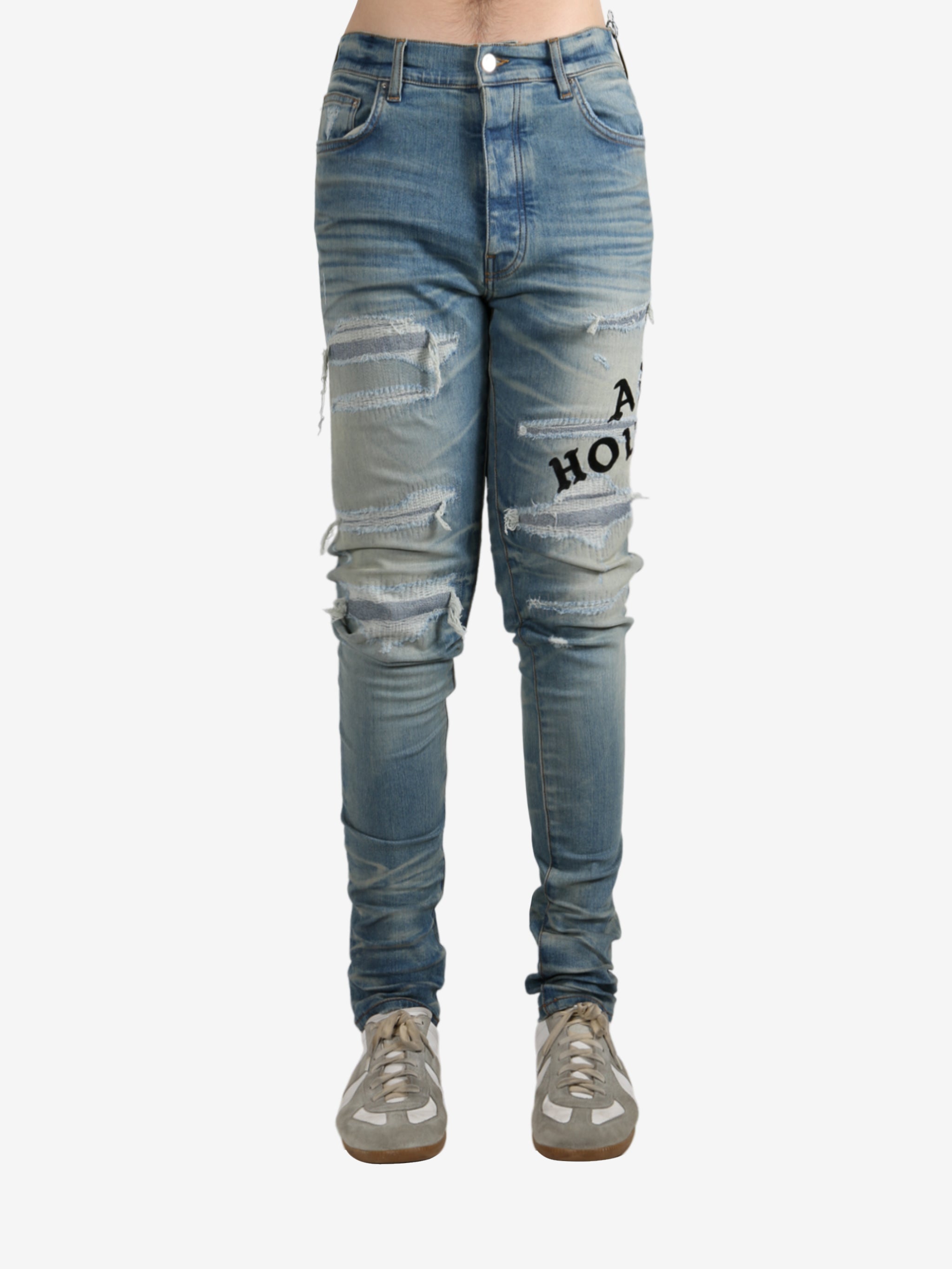 Blue pants worn by a person, showing the pants fit