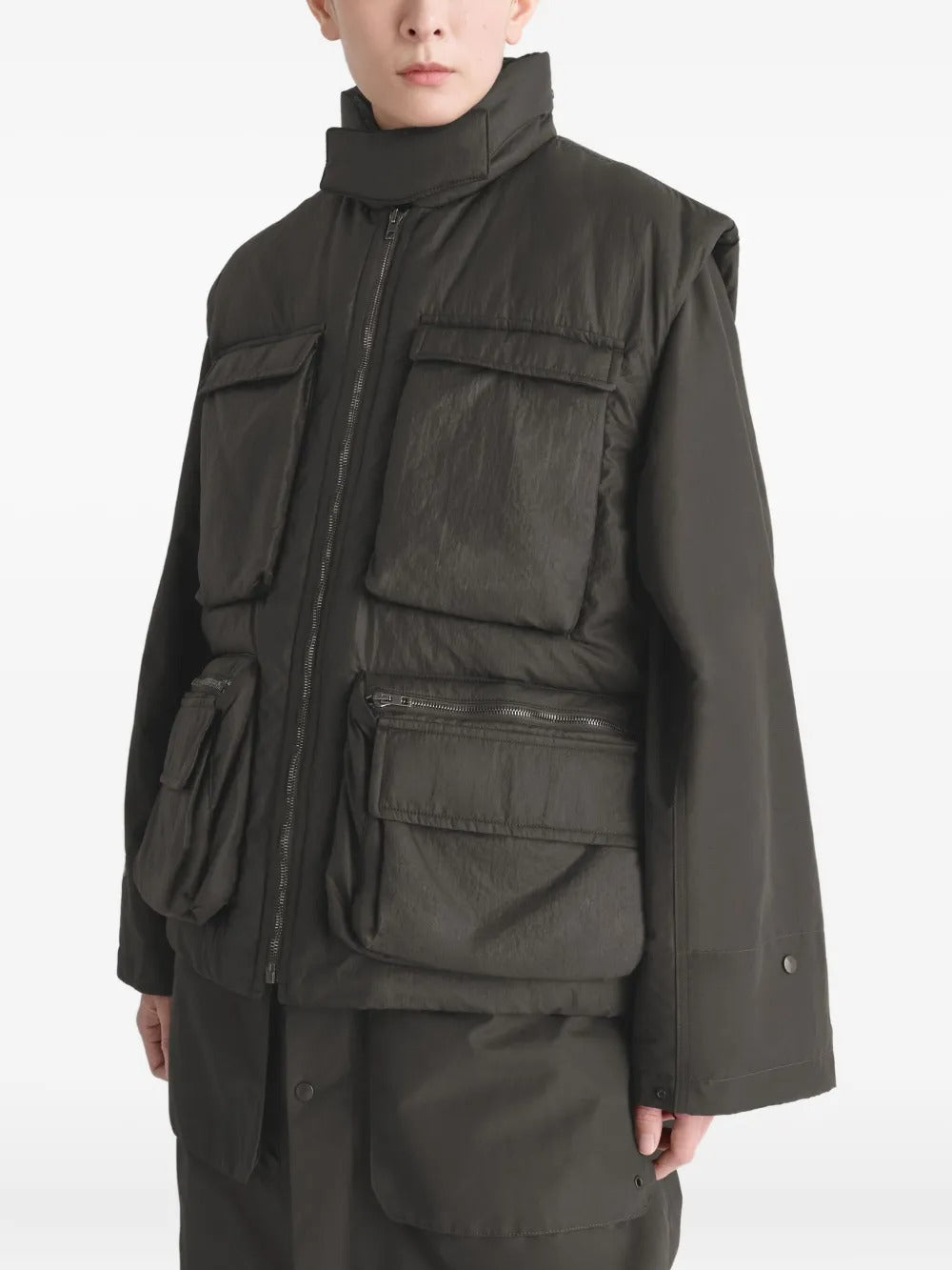 Brown coat worn by a person, showing the coat's fit