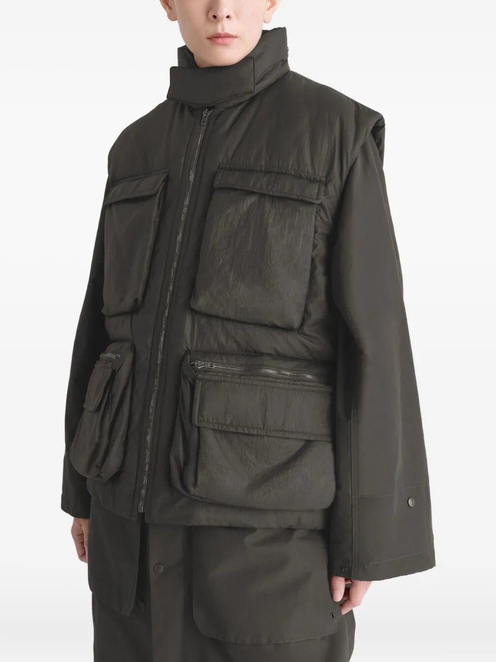 Brown coat worn by a person, showing the coat's fit