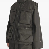 Brown coat worn by a person, showing the coat's fit