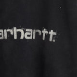 Close up of Black t-shirt, showing texture of the 100% organic cotton made fabric