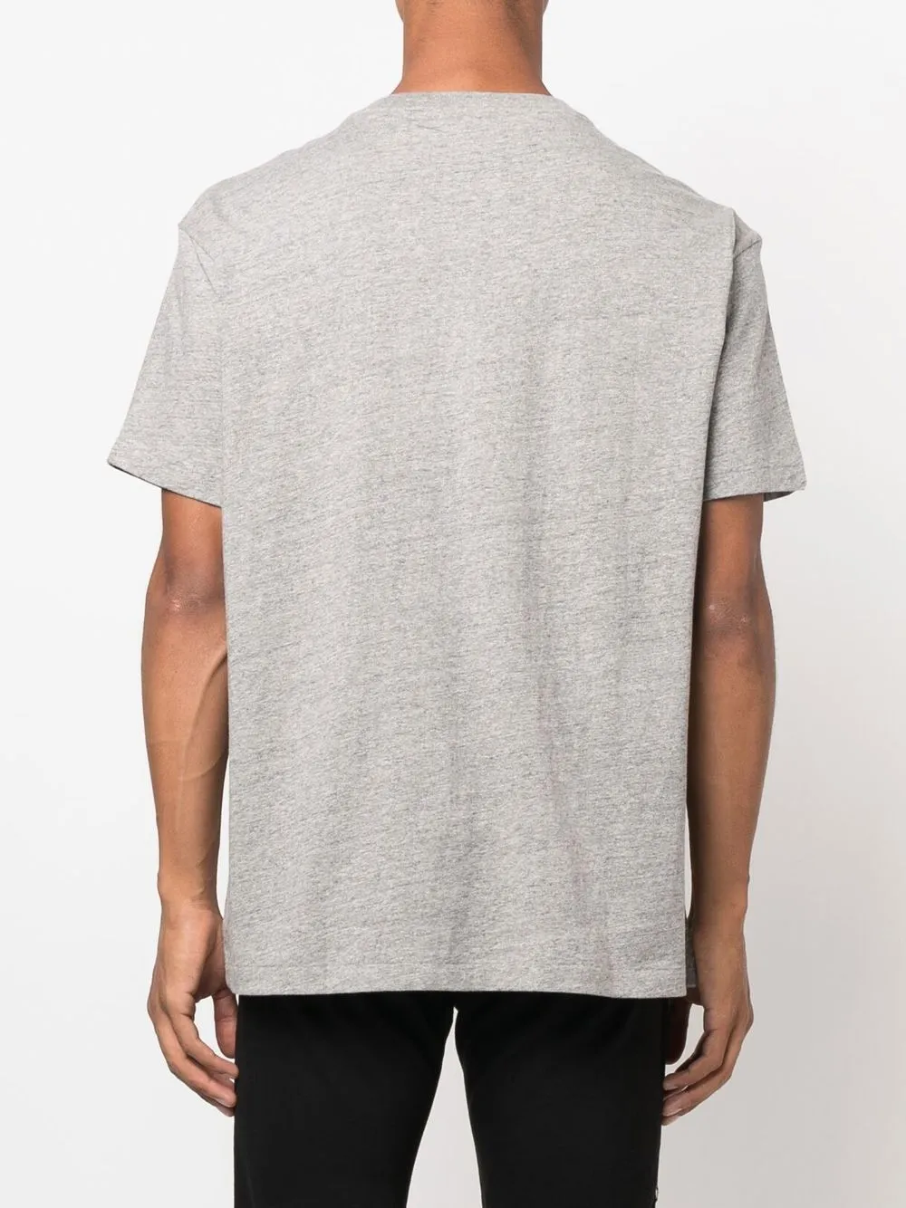 Grey T-shirt worn by a person, showing the T-shirt's fit