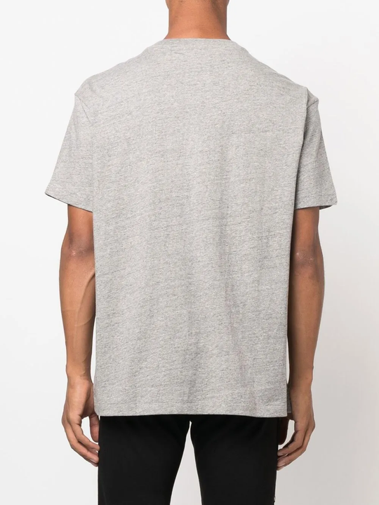 Grey T-shirt worn by a person, showing the T-shirt's fit