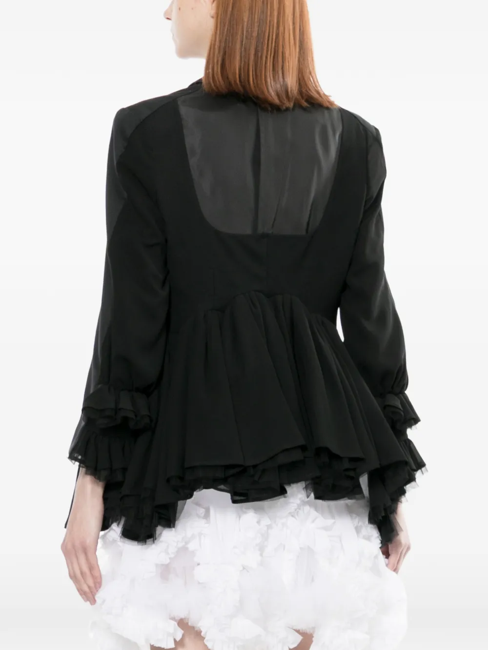 black jackets and coats worn by a person, showing the jackets and coats fit