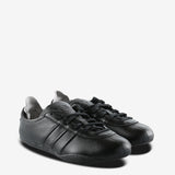 Black sneakers, side view