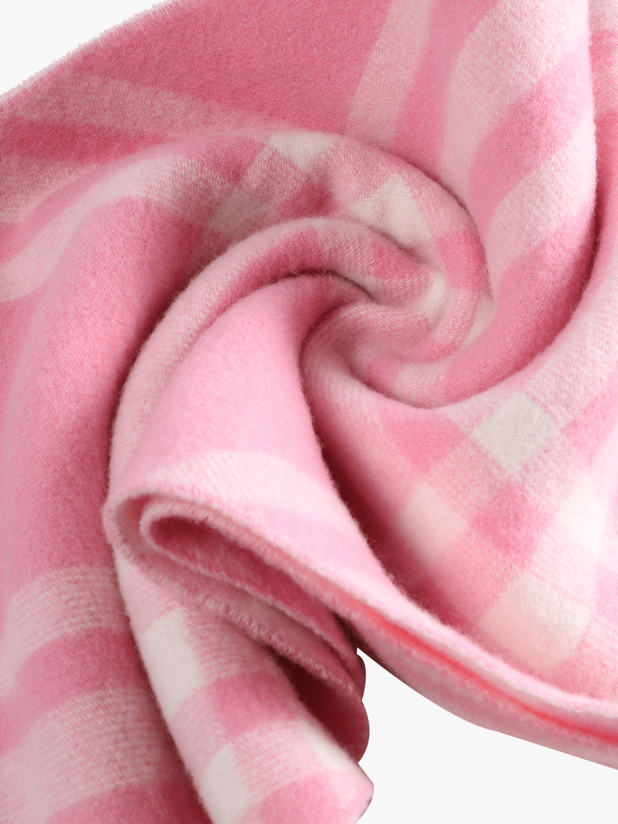 Close up of pink scarf, showing texture of the Cashmere fabric