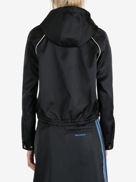 Black hoodie worn by a person, showing the hoodie's fit