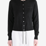 Black jacket worn by a person, showing the jacket fit