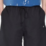 Black shorts, worn by a person, showing the shorts' fit