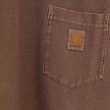 Close up of Brown jacket, showing texture of the 100% organic cotton made fabric