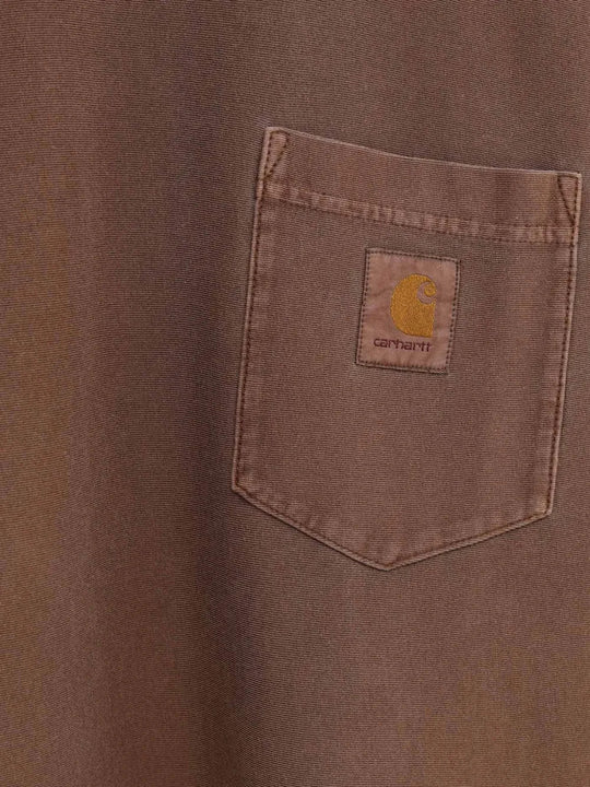 Close up of Brown jacket, showing texture of the 100% organic cotton made fabric