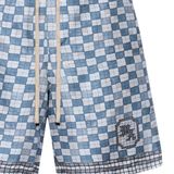 close up of blue shorts, showing texture of the silk fabric