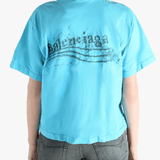 Blue t-shirt worn by a person, showing the shirt's fit