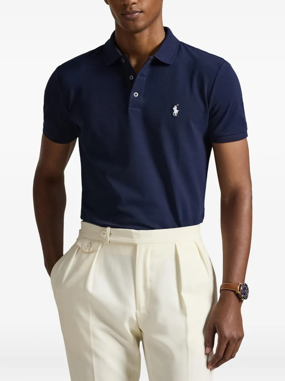 Navy shirt worn by a person, showing the shirt's fit
