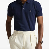 Navy shirt worn by a person, showing the shirt's fit