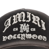 Close up of black hat, showing texture of the cotton fabric