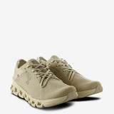 Tan sneakers, side view