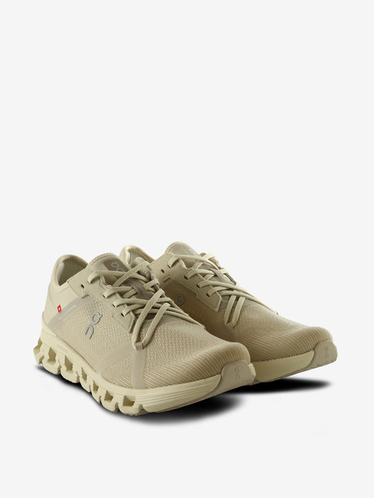 Tan sneakers, side view