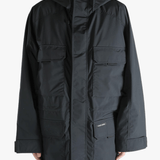 Black jacket worn by a person, showing the jacket's fit