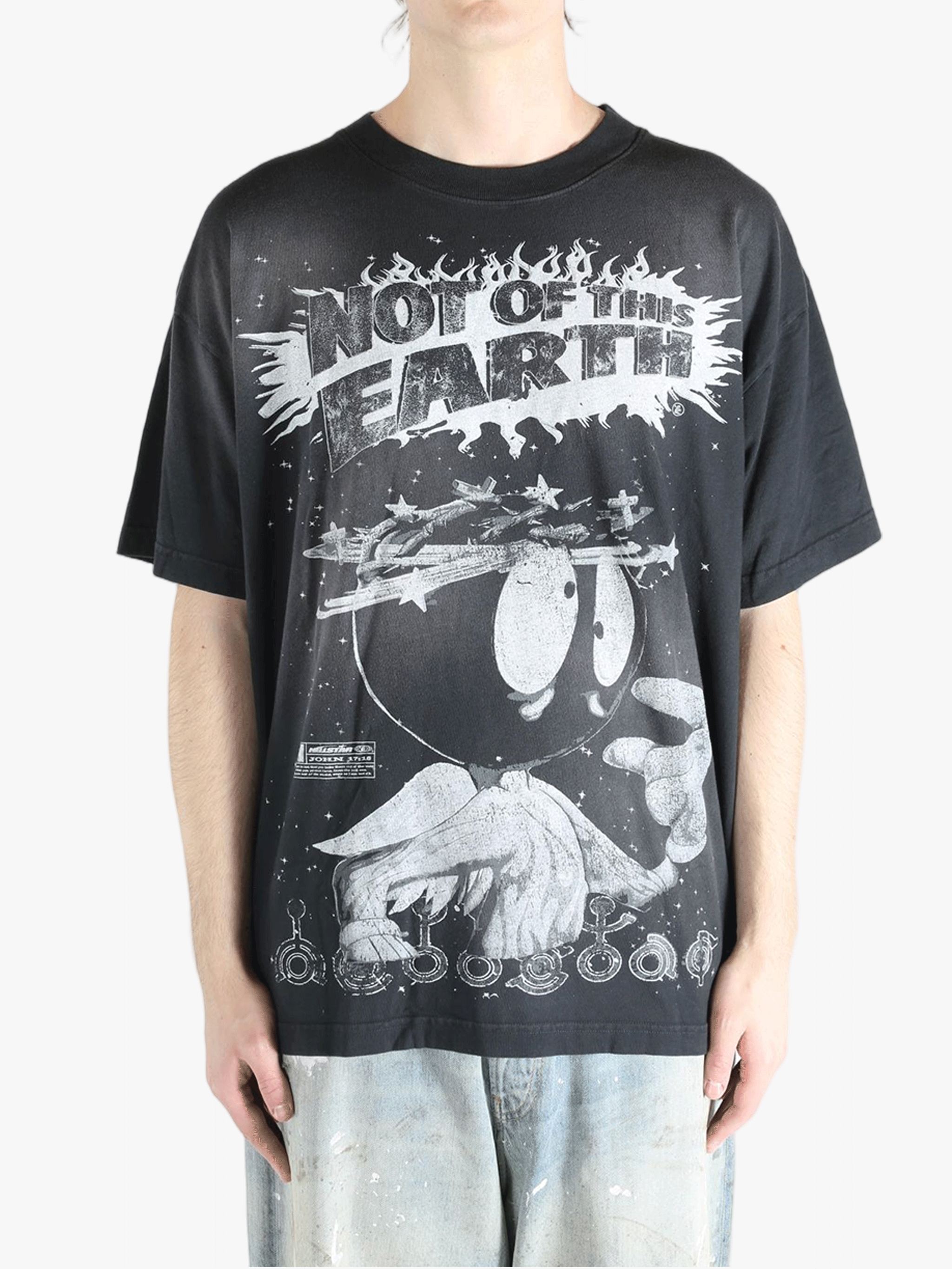 Black t-shirts worn by a person, showing the t-shirts fit